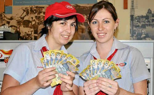 IGA staff Ashley Thomson and Bec Hing are glad to see so much support from shoppers. IGA staff Ashley Thomson and Bec Hing are glad to see so much support from shoppers.